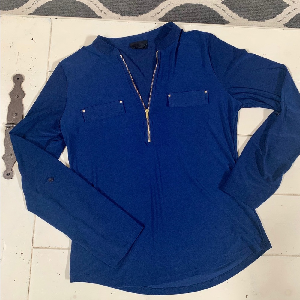 Dark blue blouse with gold accents